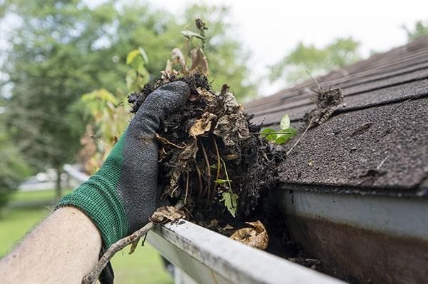 gutter cleaning is still necessary with gutter guards to remove finer debris that can accumulate and cause blockages